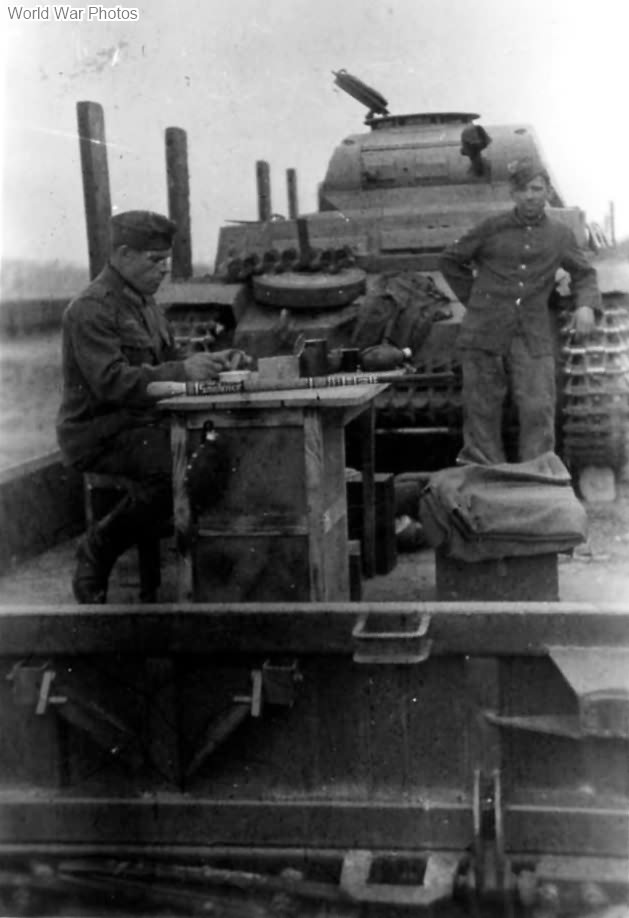 Panzer II on railroad flat car in transit to the front