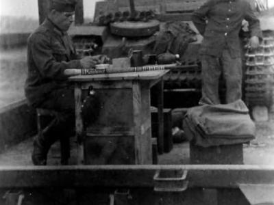 Panzer II on railroad flat car in transit to the front