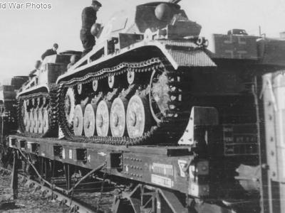 Panzer II loaded onto a rail car for transport