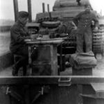Panzer II on railroad flat car in transit to the front