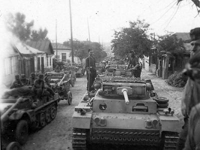 Column of Panzer III tanks on a road in Russia