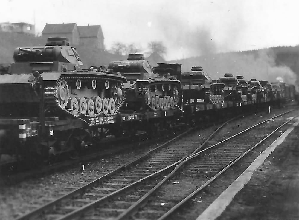 Panzer III being transported on rail car World War Photos