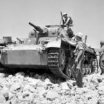 British soldiers inspecting a captured Panzer III of the DAK 2 May 1941
