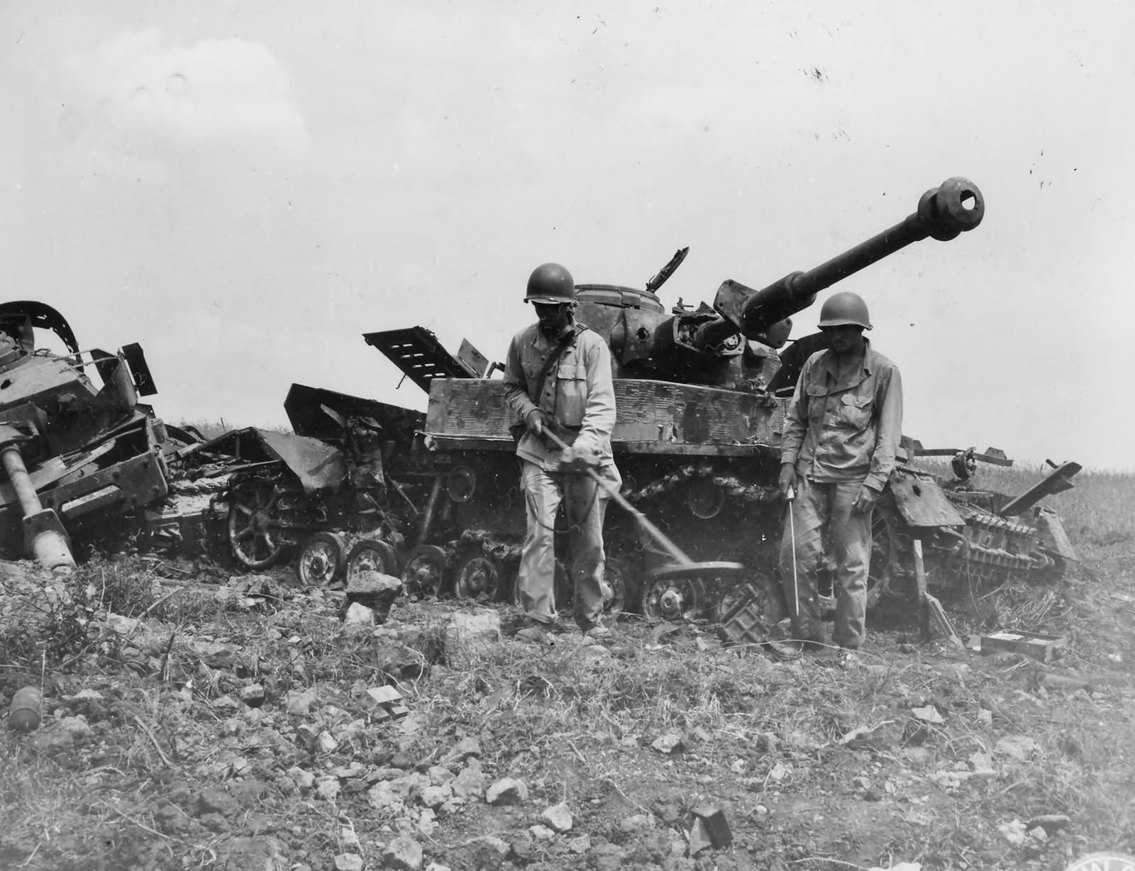 1st Armored Division Engineers sweep for mines in front of two Panzer IV Anzio 1944