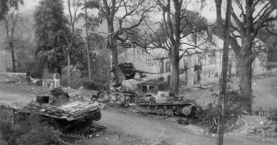 Destroyed Panzer III of the 7th Panzer Division and Sd.Kfzz 8 2