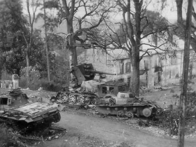 Destroyed Panzer III of the 7th Panzer Division and Sd.Kfzz 8 2
