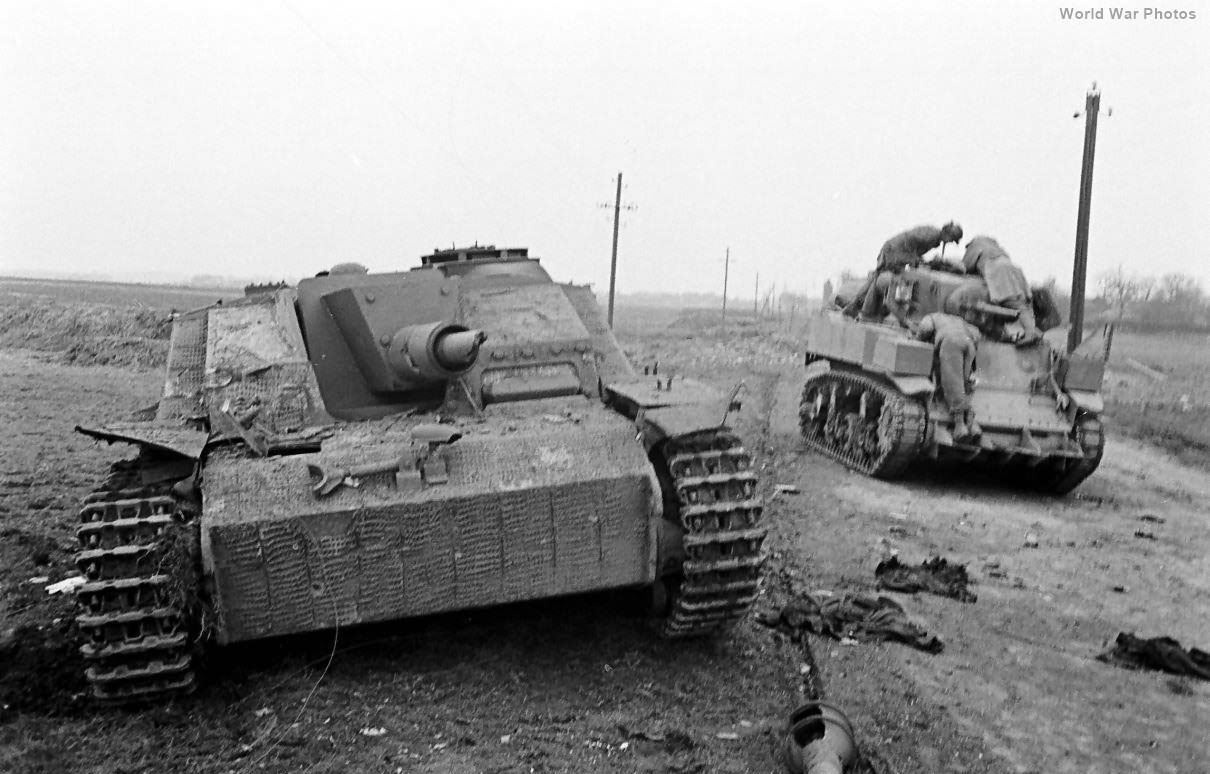 Destroyed StuG 40 and M5A1