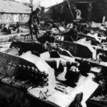 Russian workers inspect captured Stugs