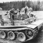 Albert Speer riding a turretless Tiger tank