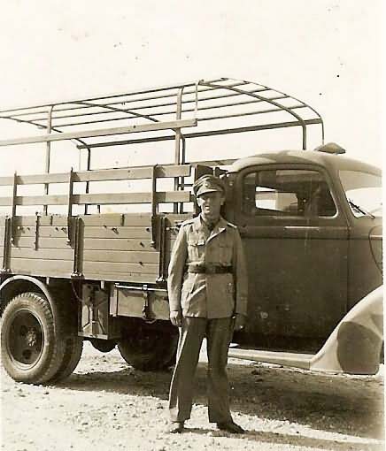Luftwaffe Afrika Korps officer posed by 4 x 2 Ford type V 3000 S