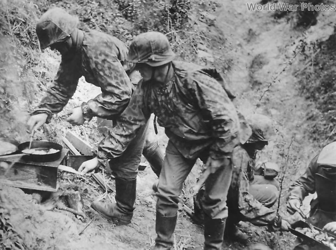 Soldiers preparing a meal at an outpost on the Western Front ’40