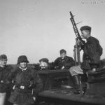 Soldiers of the Waffen-SS with halftrack Holland