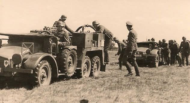 Wehrmacht Troops in Field with Krupp L2H143
