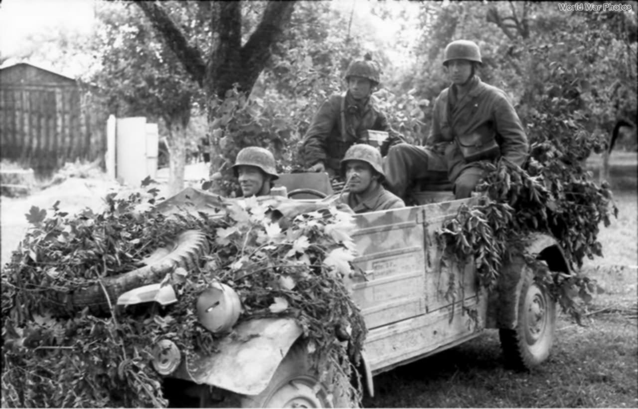 Fallschirmjagers riding Kübelwagen, France 1944