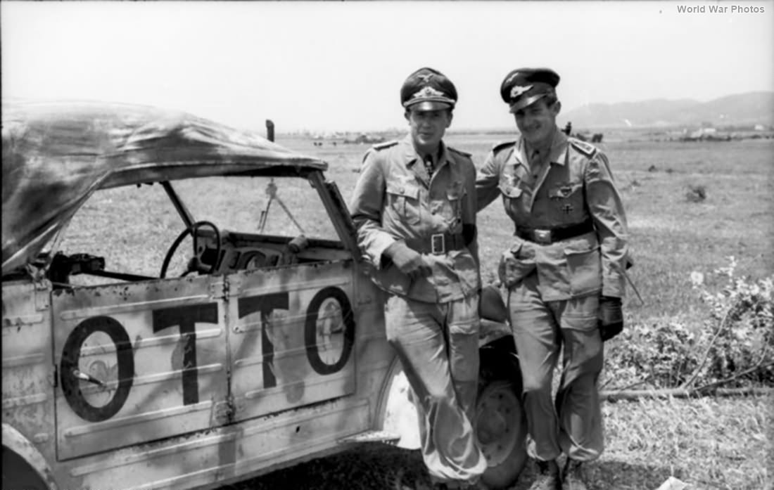 Hans Joachim Marseille next to a Kubelwagen OTTO