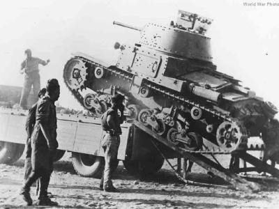 Loading M13/40 onto truck