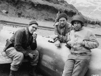 GI’s lounge on Nakajima A6M2-N wreck Attu May 1943