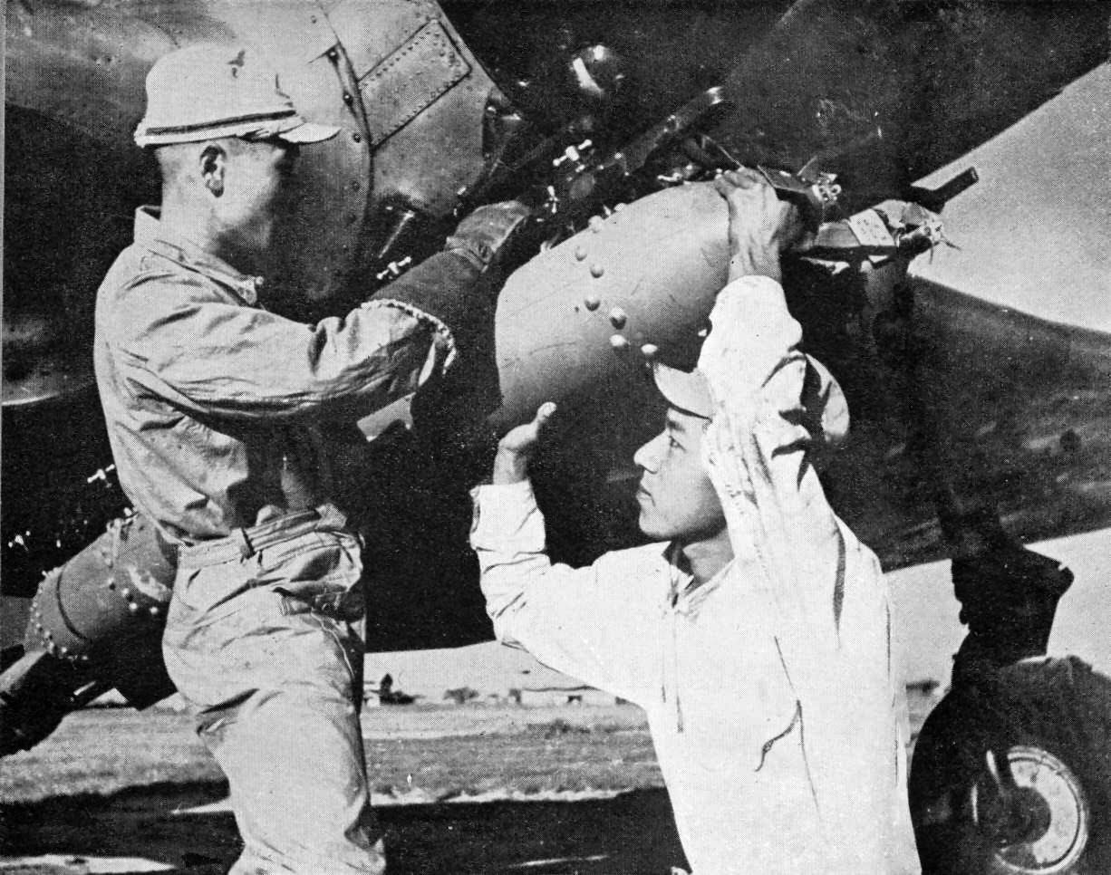 Loading a 60 kg bomb on a B5N
