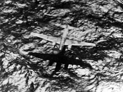 Mitsubishi G4M Betty under attack by a PB4Y-1 Liberator of VB-106