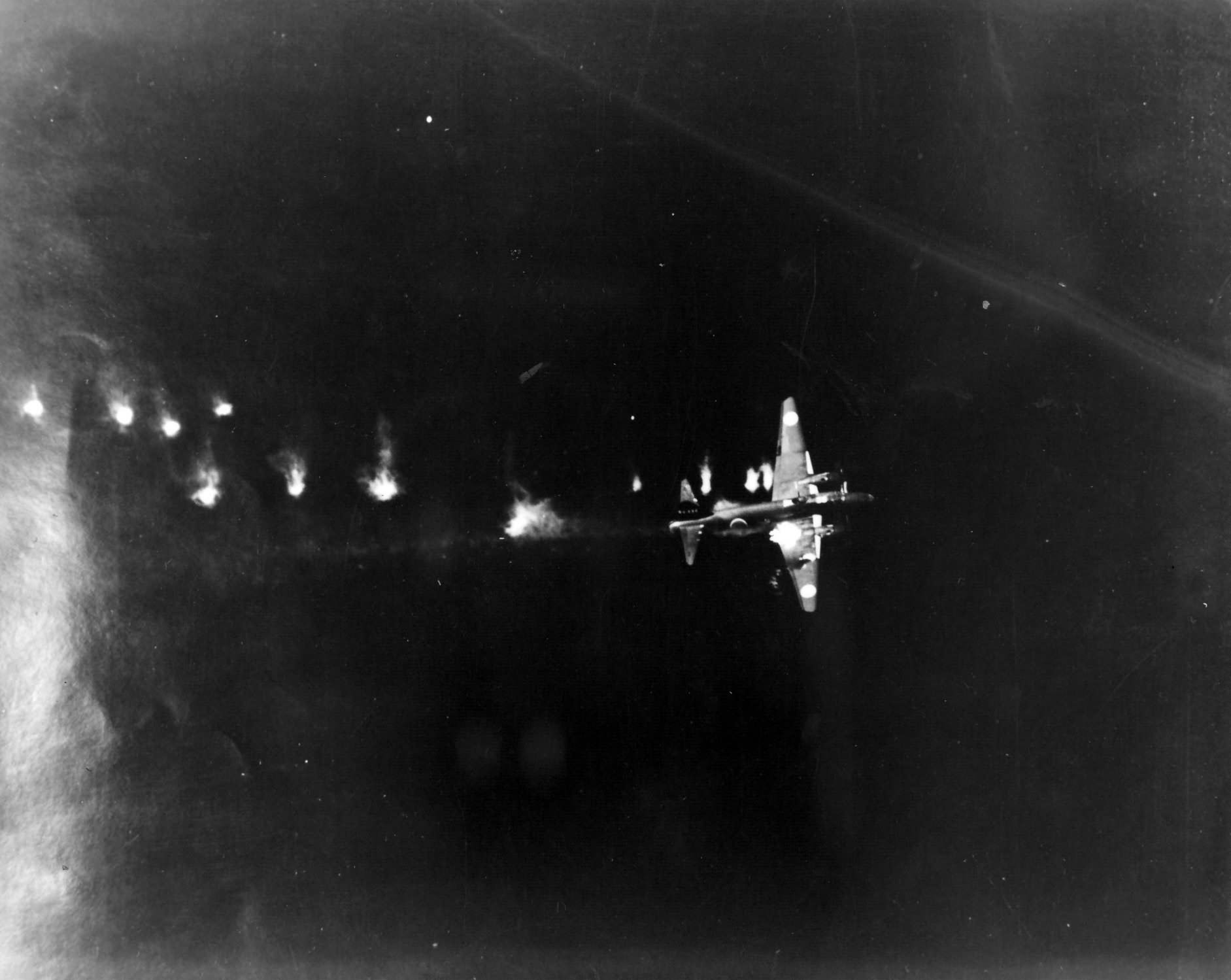 Mitsubishi G4M Betty in flames after being shot down by the PB4Y-1 „Porter’s Posse” of VB-106 off the coast of Biak Island on May 15, 1944