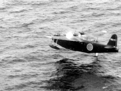 H8K2 801-77 under fire from PB4Y of VPB-117