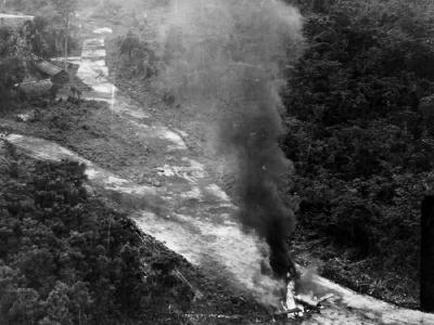 Ki-61 Hien burns at Kamiri Netherlands East Indies after attack of the 3rd Bombardment Group 8th BS 5th Air Force May 21 1944