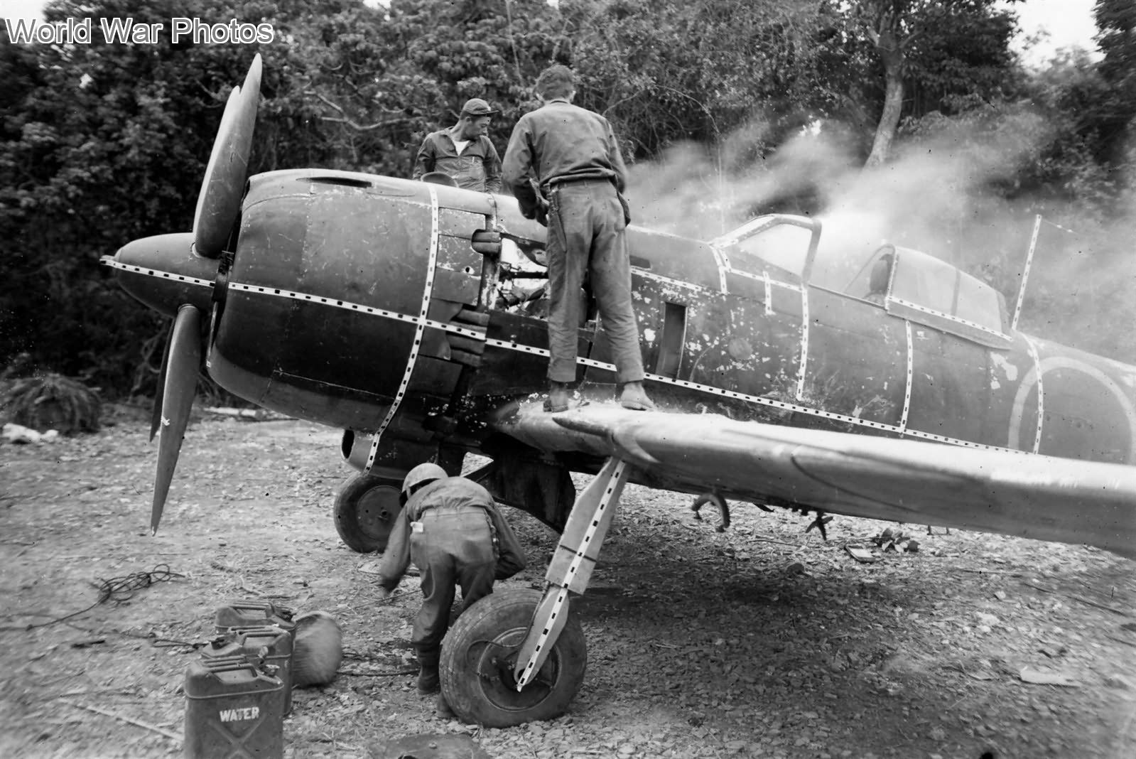 Captured Ki-84 on fire after strafing. Okinawa | World War Photos