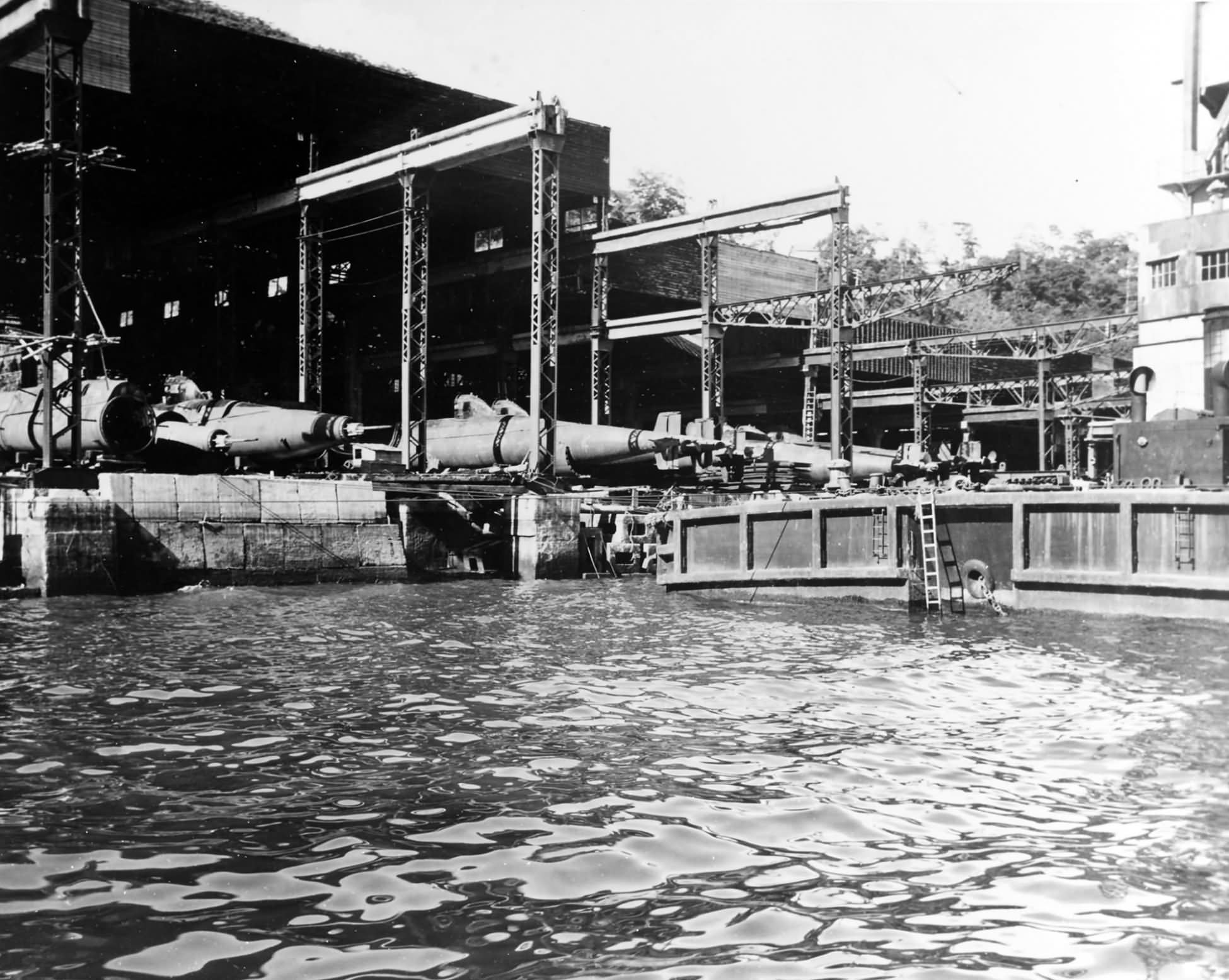 Type D midget submarines in an assembly shed at the Mitsubishi shipyard Nagasaki 1945