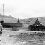 Marines Use Captured Japanese Truck to Tow Type 95 Ha Go Light Tank Saipan 1944