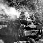 Type 95 Ha Go light tanks burning on Guam 1944