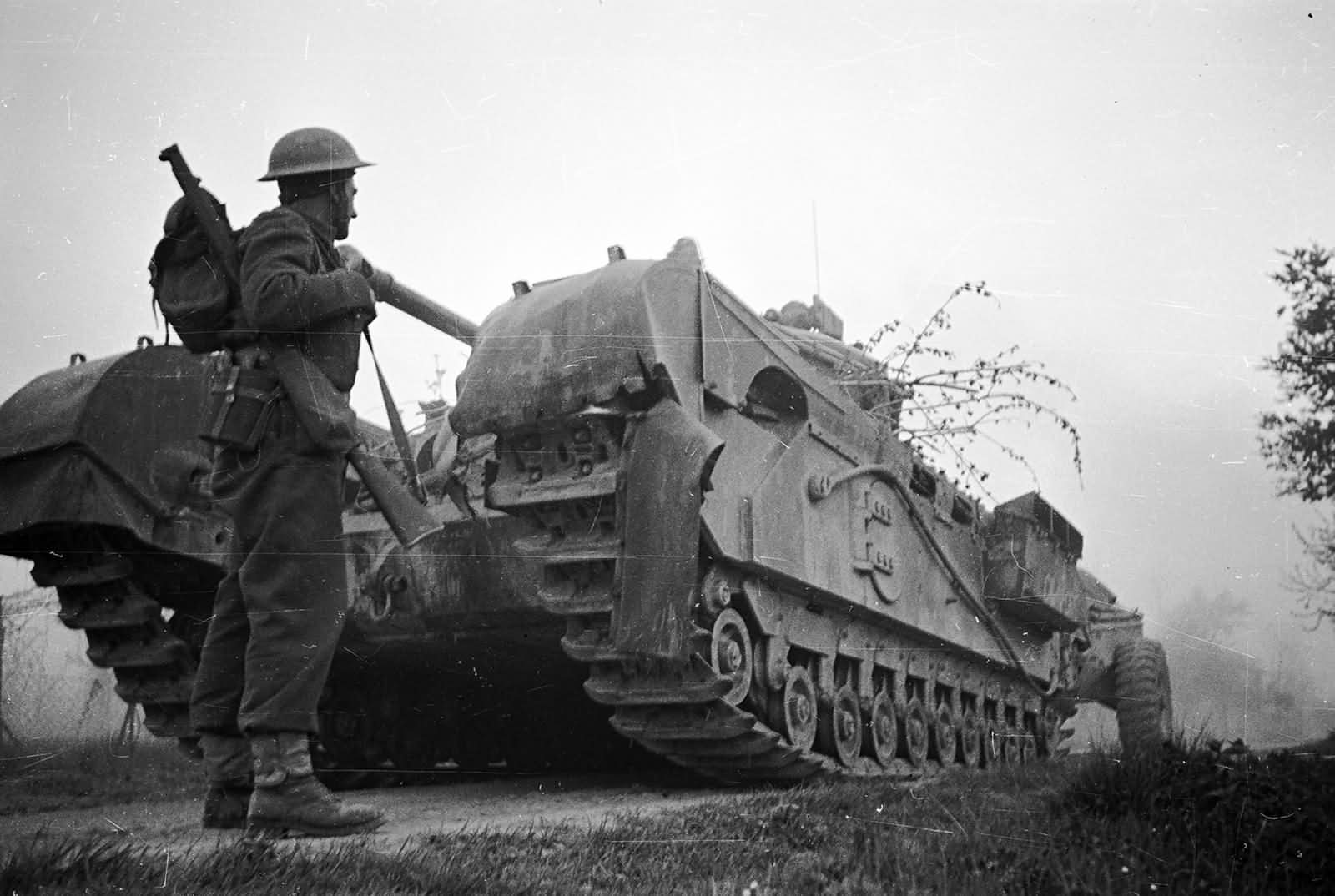 Churchill Crocodile tank and NZ soldier Senio River Italy April 1945
