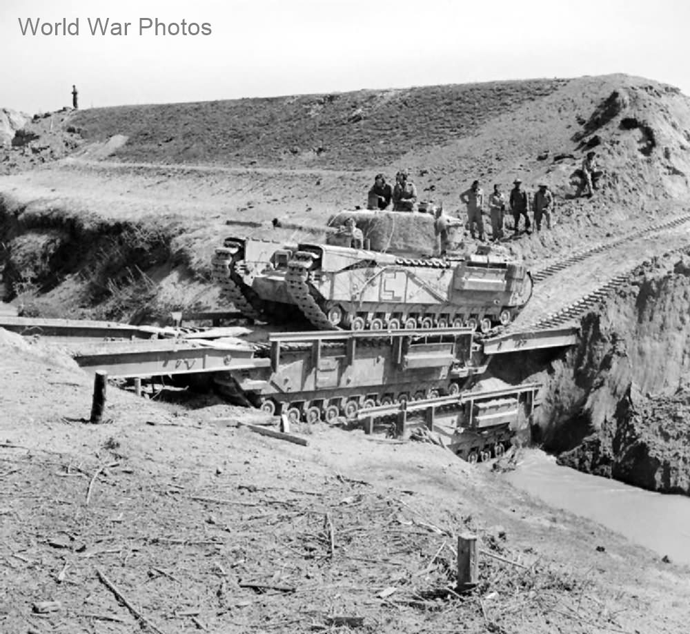 Churchill Mk IV of North Irish Horse crossing the Senio River over two Churchill Ark, April 1945