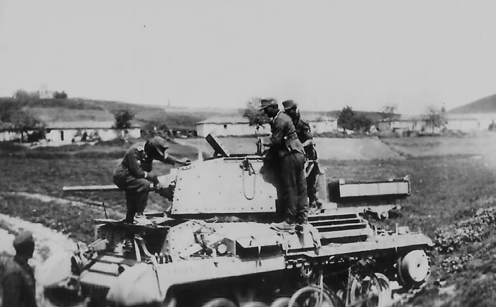 Gebirgsjagers examining Abandoned A10 tank