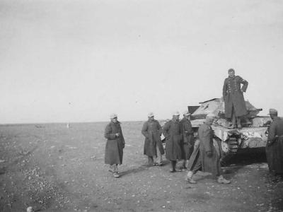 Captured Crusader tank and Afrika Korps soldiers