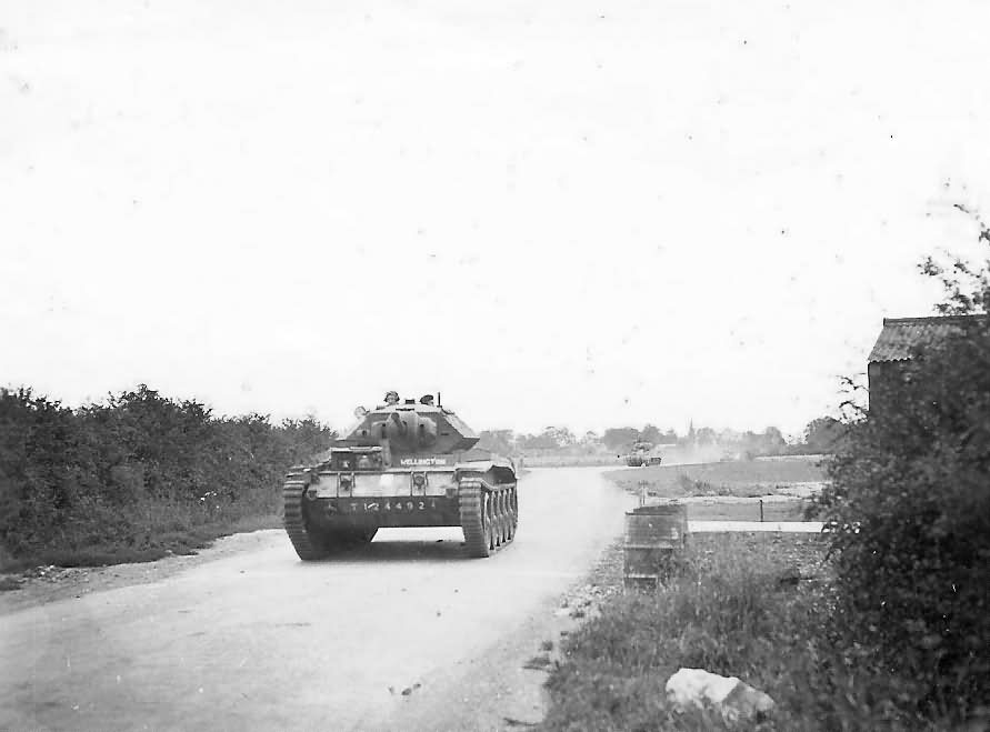 Crusader tank moving on country road England photo