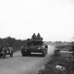 Crusader tank moving on country road England