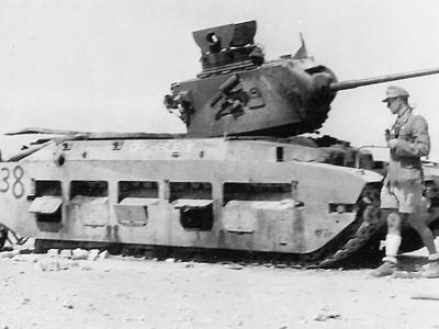 Afrika Korps Soldier Next to a KO British Matilda Tank named CRUCIBLE II