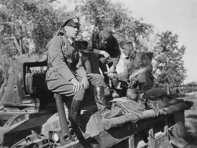 Wehrmacht soldiers and British infantry tank Matilda II