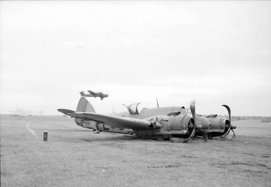 Damaged Beaufighter TF Mk X NE831 code PL-O of No 144 Squadron RAF at Dallachy