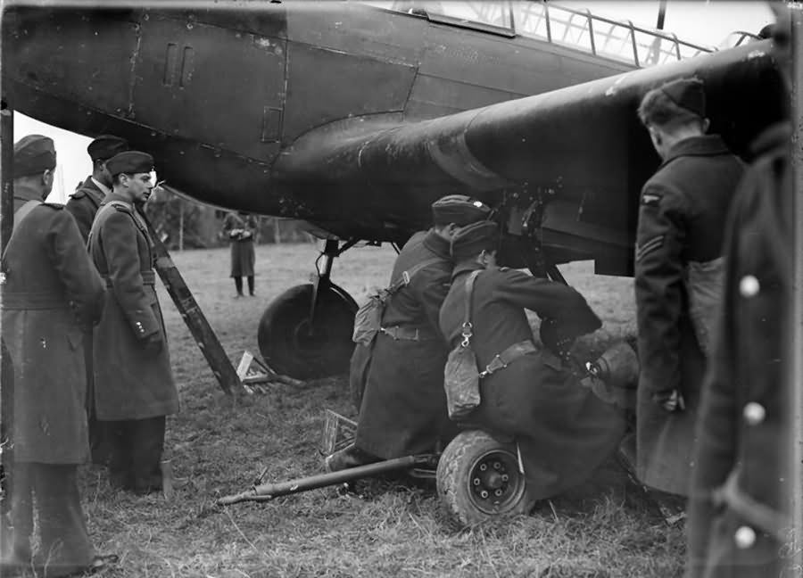 King George VI watching bombs being hand winched into the bomb bays of a Fairey Battle