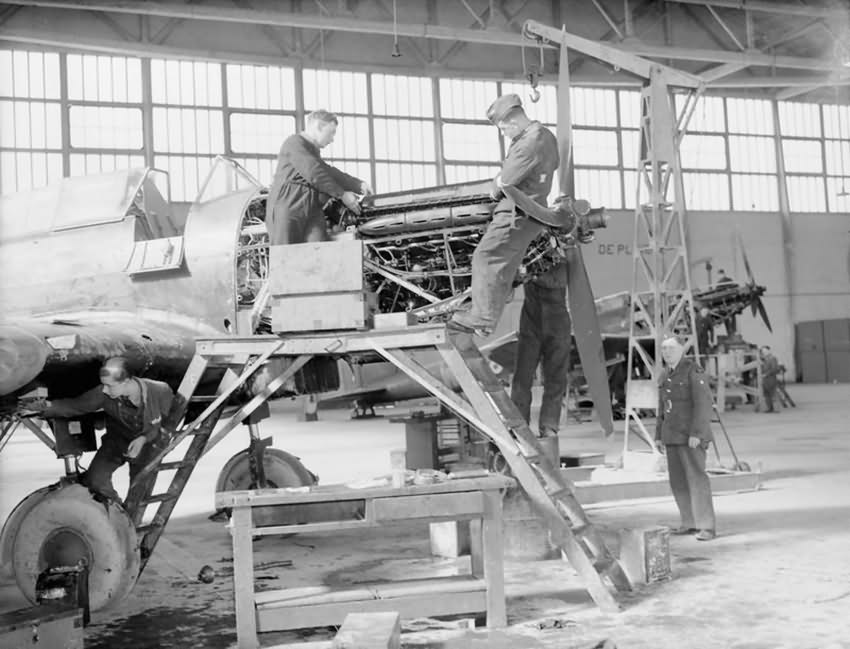 Mechanics of No. 226 Squadron RAF overhaul the engines of Battles at Reims