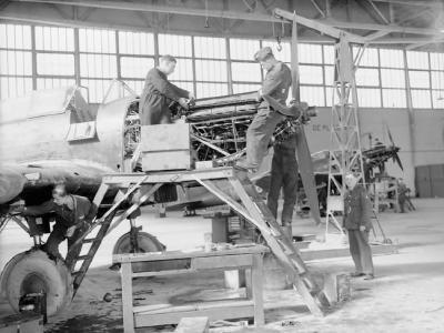 Mechanics of No. 226 Squadron RAF overhaul the engines of Battles at Reims