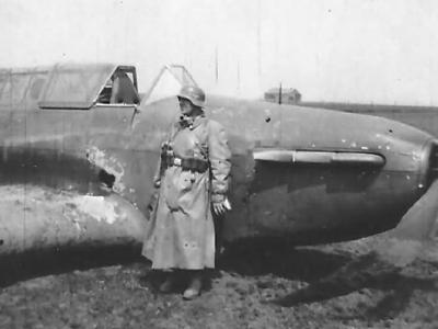 wehrmacht soldier next to a Fairey Battle
