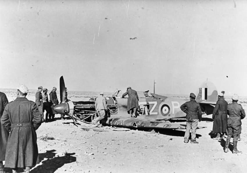 German soldiers inspect Hurricane Mk II code FZ-P of No 94 Squadron RAF shot down in North Africa