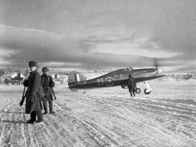 Hurricane Mk IIB Z5253 GA-25 of No 134 Squadron RAF taxies out past Russian sentries at Vaenga