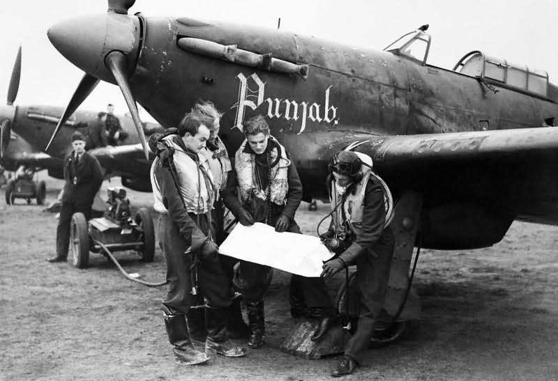 Pilots and Hurricanes of No 56 Punjab Squadron at Duxford 2 January 1942