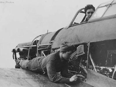 WAAFs work on a Hurricane