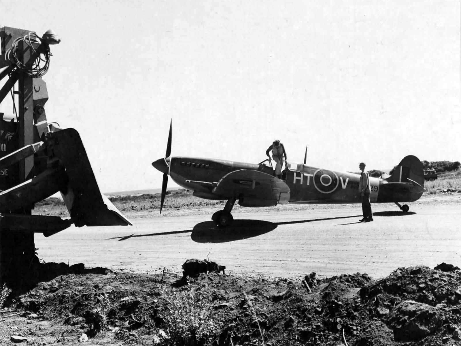 Spitfire Mk IX code HT-V of No. 154 Squadron at base in Corsica