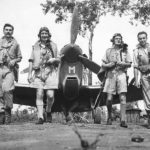 RAF No. 54 Squadron Leader E.M. Gibbs with pilots Cavanagh, Norwood and Thompson with Spitfire Mk Vc in Australia