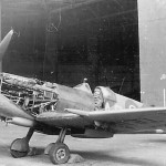 Supermarine Spitfire Fighter Parked by Hangar